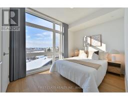 Bedroom 2 - 223 8 Steckley House Lane, Richmond Hill, ON L4S0N1 Photo 4