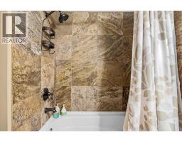 Bedroom - 112 379 Spring Creek Drive, Canmore, AB T1W0G8 Photo 4