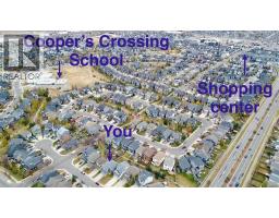 Kitchen - 217 Coopers Grove Sw, Airdrie, AB T2B0G4 Photo 3