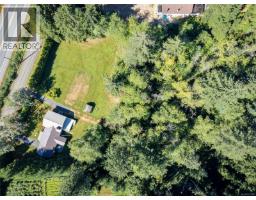 Family room - 7602 Island Hwy N, Black Creek, BC V9J1G3 Photo 4