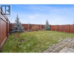 Living room - 71 Mount Rae Heights, Okotoks, AB T1S0N7 Photo 4