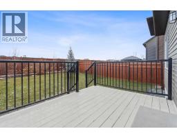 Dining room - 71 Mount Rae Heights, Okotoks, AB T1S0N7 Photo 2