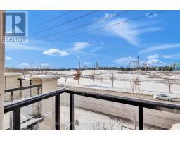 Dining room - 9 9601 Jane Street, Vaughan, ON L6A4G5 Photo 2