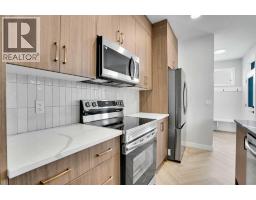 Kitchen - 144 Cobblestone Gate Sw, Airdrie, AB T4B5J9 Photo 3