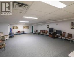 Laundry room - 300 5402 50 Avenue, Stettler, AB T4K0A2 Photo 5