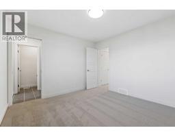 Bedroom - 220 Waterford Heath, Chestermere, AB T1X2Z7 Photo 2