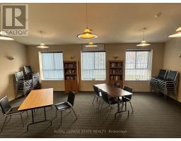 Living room - 309 210 Main Street E, Haldimand, ON N1A3G7 Photo 2