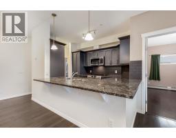 Living room - 3201 4 Kingsland Close Se, Airdrie, AB T4A0J3 Photo 2