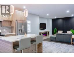 Laundry room - 722 Coopland Crescent Unit 1, Kelowna, BC V1Y2V1 Photo 5