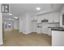 Living room - Unit 5 19 Marret Lane, Clarington, ON L1B1J2 Photo 2