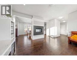 Living room - 161 Rainbow Falls Glen, Chestermere, AB T1X0S5 Photo 4