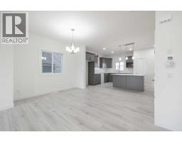 2pc Bathroom - 19 Appaloosa Way, Cochrane, AB T4C2M3 Photo 4