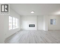 Living room - 19 Appaloosa Way, Cochrane, AB T4C2M3 Photo 2