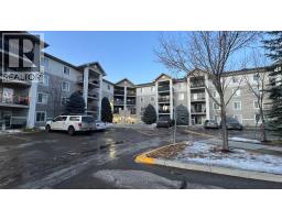 Living room - 1208 12 Cimarron Common, Okotoks, AB T1S2G1 Photo 2