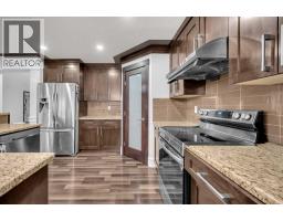 Family room - 475 East Lakeview Road, Chestermere, AB T1X0A2 Photo 2