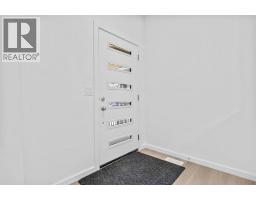 Living room - 2321 Lancaster Heights Se, Airdrie, AB T4A3P3 Photo 5