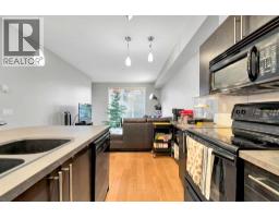 Living room - 109 2307 14 Street Sw, Calgary, AB T2T3T5 Photo 3