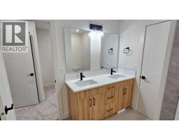 Laundry room - 2 106 4 Street Nw, Sundre, AB T0M1X0 Photo 3