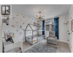 Bedroom - 202 Kinniburgh Crescent, Chestermere, AB T1X1Y2 Photo 3