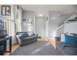 Living room - 411 River Heights Crescent, Cochrane, AB T4C0T9 Photo 4