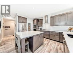 Living room - 10 Riviera Place, Cochrane, AB T4C0V4 Photo 3