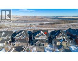 Dining room - 570 River Heights Crescent, Cochrane, AB T4C0T8 Photo 2