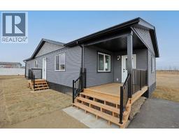 Bedroom - 323 20 Street E, Brooks, AB T1R0W9 Photo 2