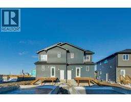 Bedroom - 121 Bridgeport Gate N, Chestermere, AB T1X3E5 Photo 4