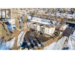 Bedroom - 106 5205 Woodland Road, Innisfail, AB T4G0B2 Photo 2