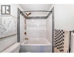 Living room - 409 Clydesdale Avenue, Cochrane, AB T4C2Y6 Photo 5