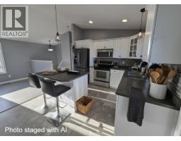 Living room - 8724 114 Avenue, Fort St John, BC V1J0C3 Photo 4