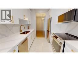 Kitchen - 35 Kingsbridge Garden Circle Unit 105, Mississauga, ON L5R3Z5 Photo 2