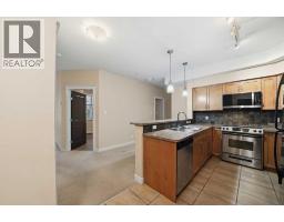 Kitchen - 207 100 Lakeway Boulevard, Sylvan Lake, AB T4S0A4 Photo 3