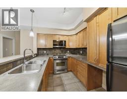 Primary Bedroom - 207 100 Lakeway Boulevard, Sylvan Lake, AB T4S0A4 Photo 4