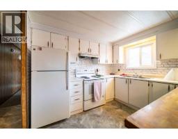 Dining room - 513 2 Avenuecrescent, Wainwright, AB T9W1A3 Photo 3