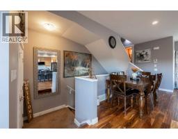 Living room - 1201 32 Horseshoe Crescent, Cochrane, AB T4C2P4 Photo 3