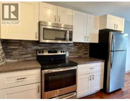 Dining room - 3 5809 65 Street, Red Deer, AB T4N5P6 Photo 2