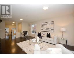 Family room - 5 Georgian Road, Brampton, ON L6X0L6 Photo 4