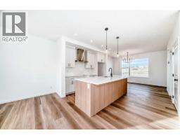 Kitchen - 406 Heartland Way, Cochrane, AB T4C3E5 Photo 3