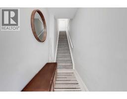 Laundry room - 408 501 River Heights Drive, Cochrane, AB T4C2L3 Photo 4