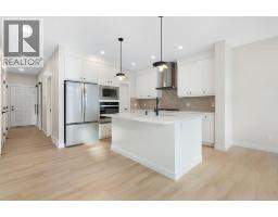 2pc Bathroom - 338 Rivercrest Road, Cochrane, AB T4C0Y4 Photo 5