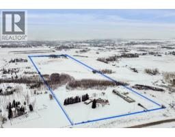 Family room - 16102 273 Avenue E, Rural Foothills County, AB T1S4M5 Photo 2