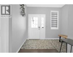 Living room - 2101 Luxstone Boulevard Sw, Airdrie, AB T4B0H6 Photo 5