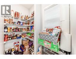 Kitchen - 151 Sundown Way, Cochrane, AB T4C0H4 Photo 4