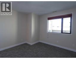 Dining room - 206 4714 A 49 Street, Stettler, AB T0C2L2 Photo 3