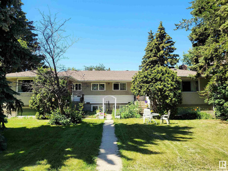 Living room - 10202 76 St Nw, Edmonton, AB T6A3A6 Photo 1