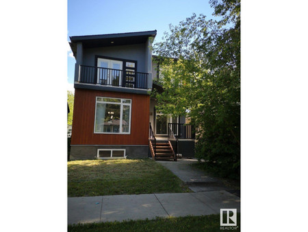 Living room - 10717 76 Av Nw, Edmonton, AB T6E1L8 Photo 1