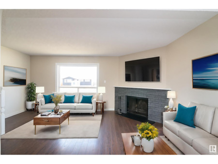 Living room - 16581 100 St Nw, Edmonton, AB T5X5H4 Photo 1