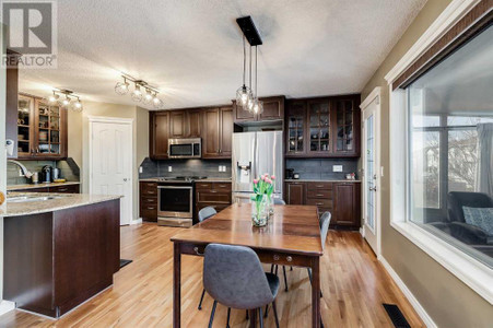 Eat in kitchen - 48 Arbour Crest Court Nw, Calgary, AB T3G3W6 Photo 1