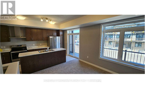 Great room - 64 Lomond Lane, Kitchener, ON N2R0T6 Photo 1